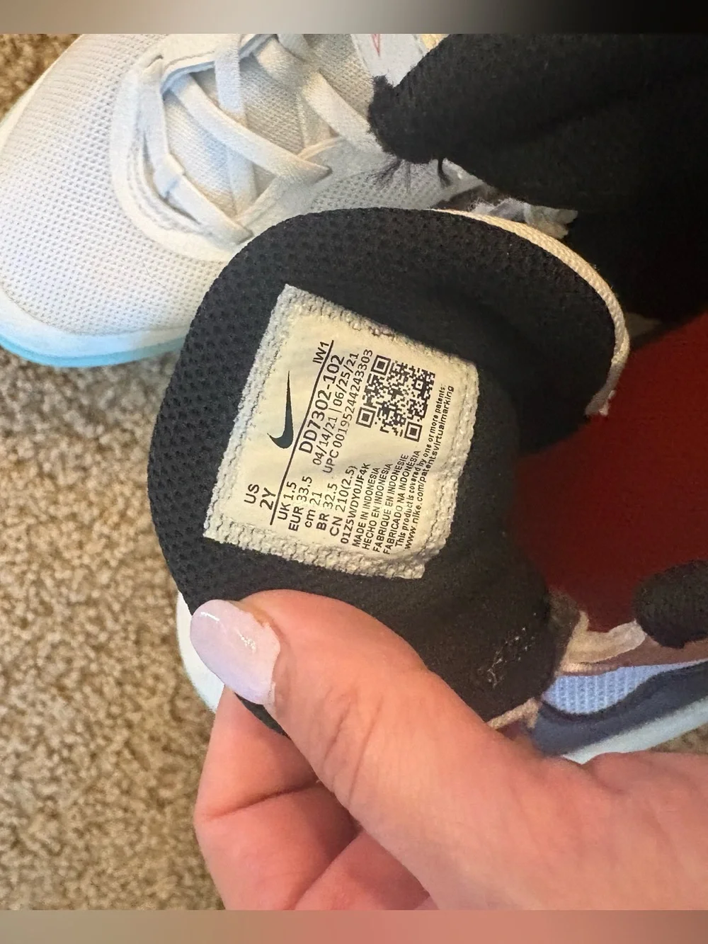Nike Kids White High-Top basketball shoes